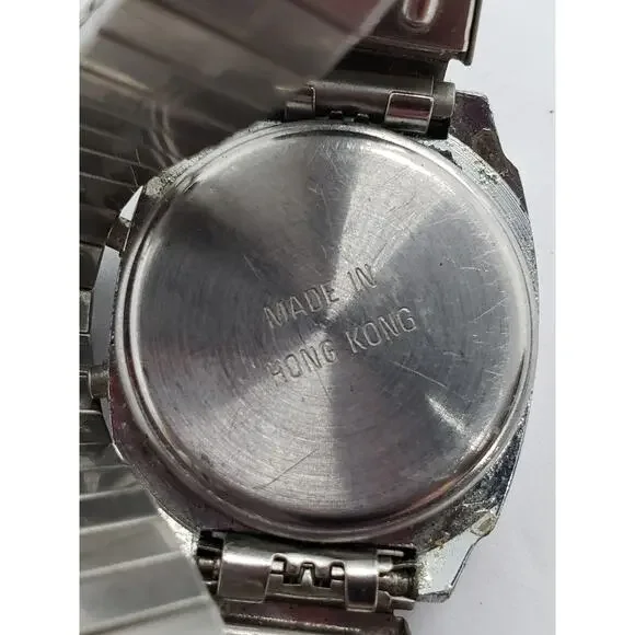 Men's digital watch. Quartz LCD. Multi function silver face
